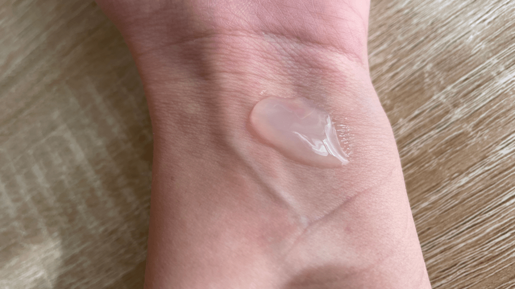 A photo of the Purito oat in gel cream on the skin shows its jelly-like consistency.